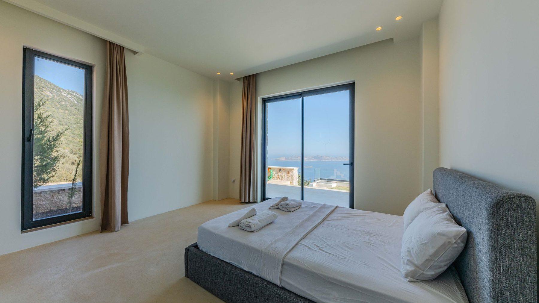 A harbour room with the window open onto Oriental Parade